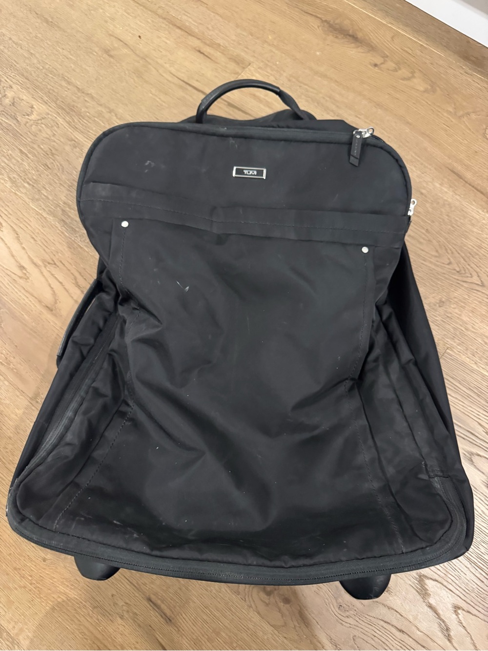 Tumi Black Rolling bag